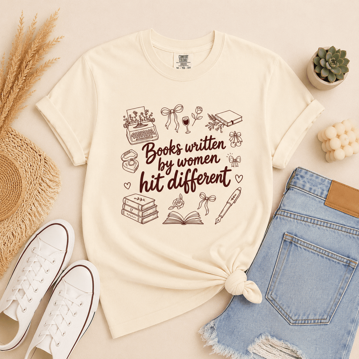 Books Written by Women Hit Different Tee - T-SHIRT - TheSpinedLife