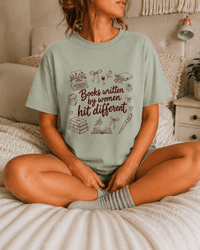 Books Written by Women Hit Different Tee - T-SHIRT - TheSpinedLife